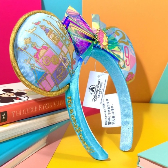 Disney Parks It’s a Small World Minnie Mouse Ears Bow Headband 2025 - Picture 8 of 10